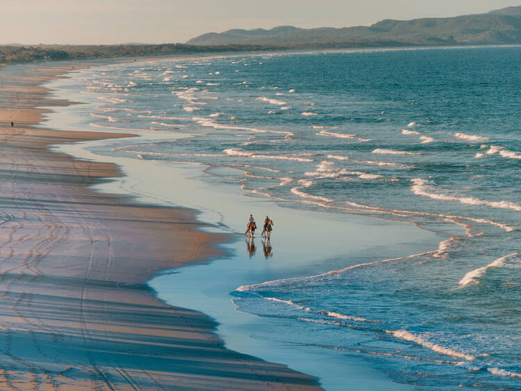 Ride horses on the beach