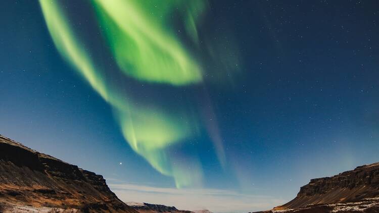 Aurora borealis, or northern lights, in the sky