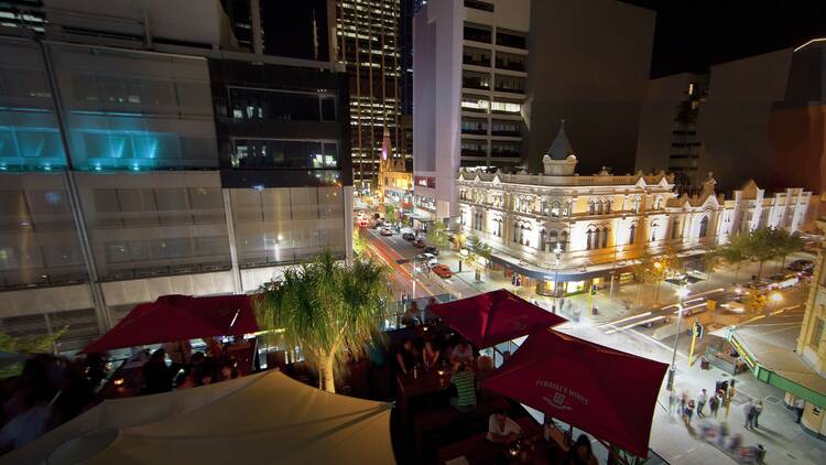 Looking over The Nest Rooftop Bar at The Aviary, to the intersection of Murray Street and William Street intersection, Perth CBD. 