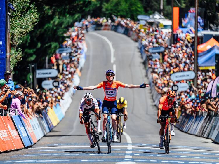 Cyclists crossing finish line