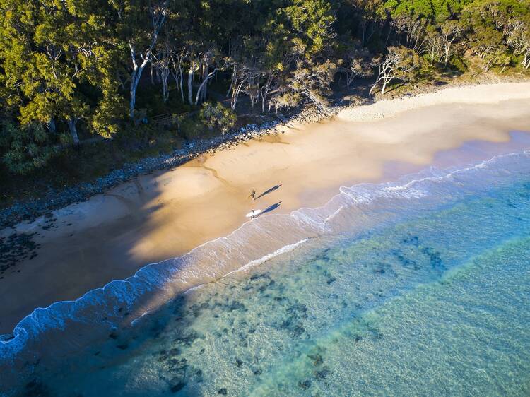 Surfers at Tea Tree Bay