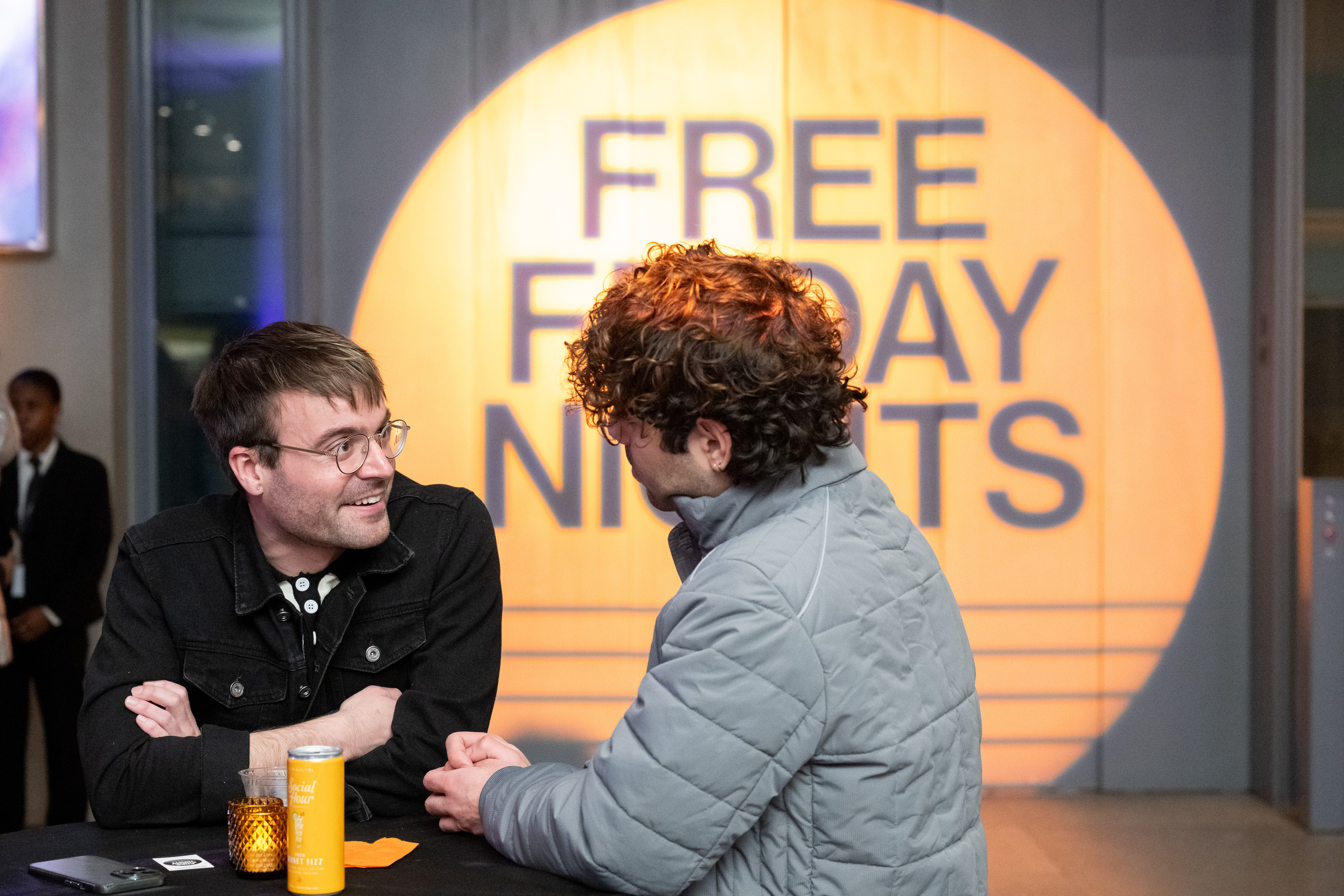 Two people talk during a free program at the Whitney.