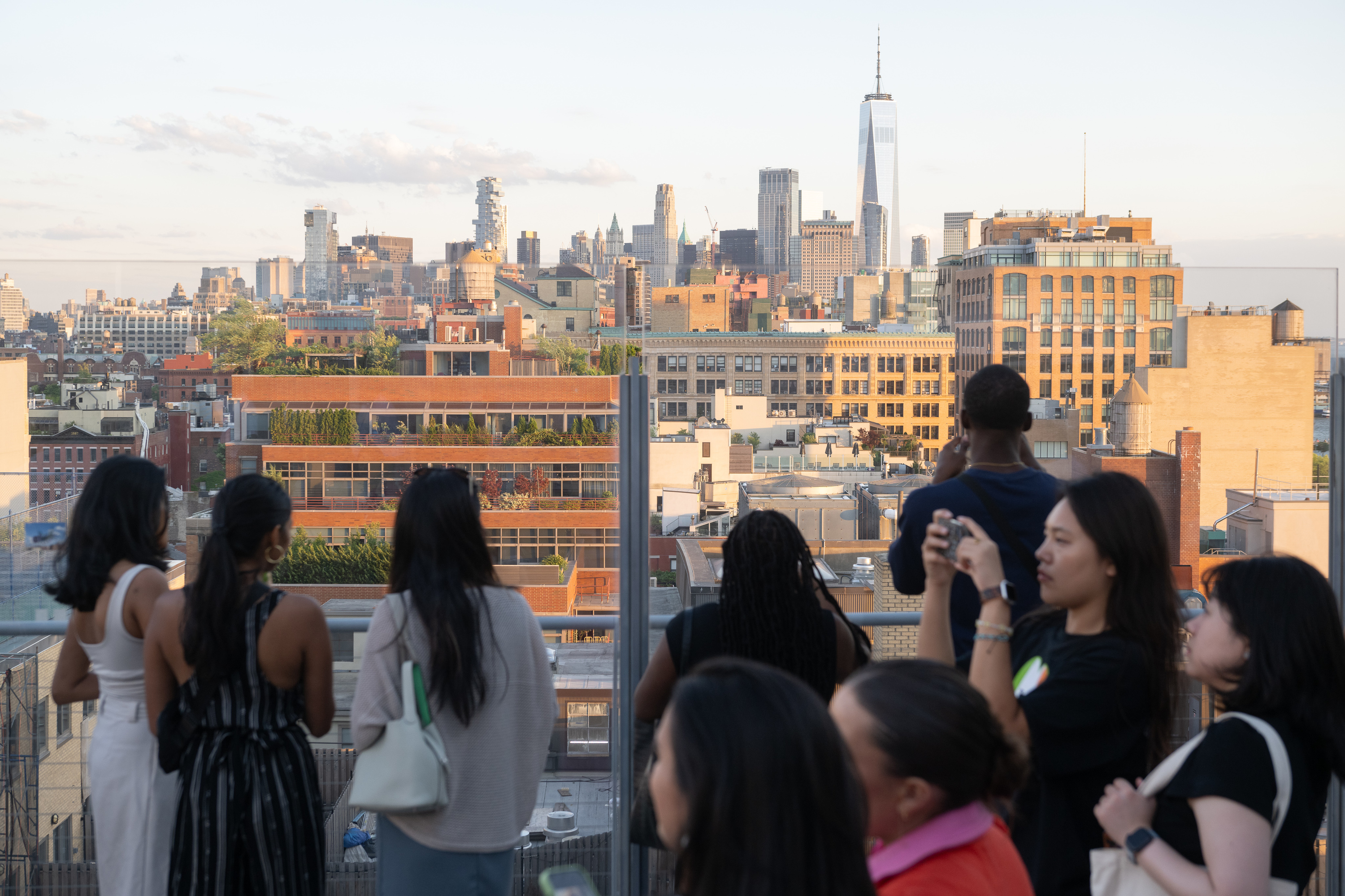 A group of people on the rooftop of the Whitney.