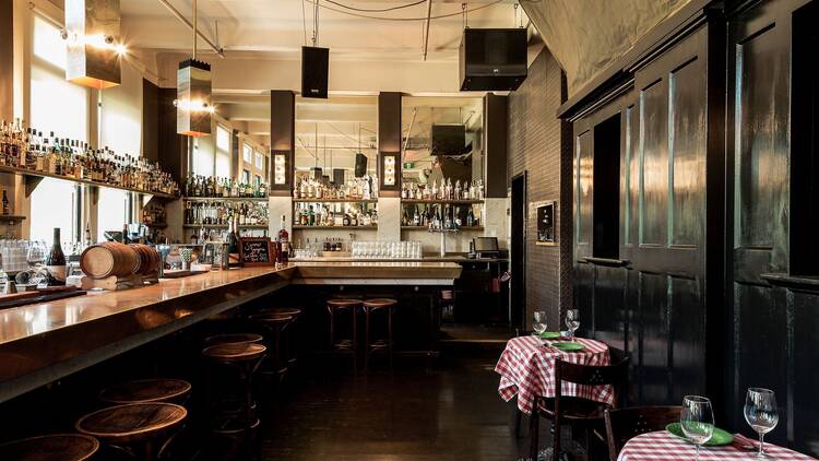 A bar with wooden furnishings. 