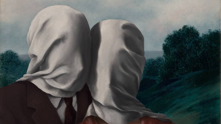 Magritte's 'The Lovers' painting of two people embracing covered in bedsheets