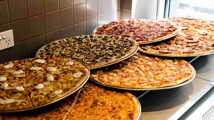 Six giant New York-style pizzas.