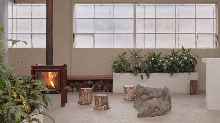 The fireplace and seating area at Inner Studio.