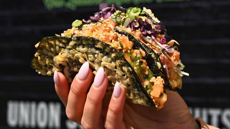 Torched salmon teriyaki crispy nori tacos at gogo ya