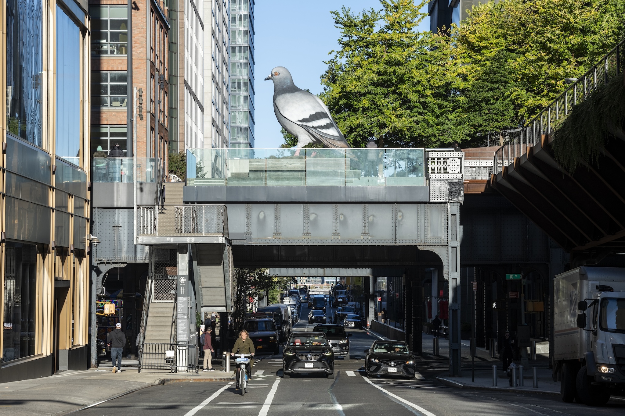 A pigeon sculpture on a bridge in NYC.