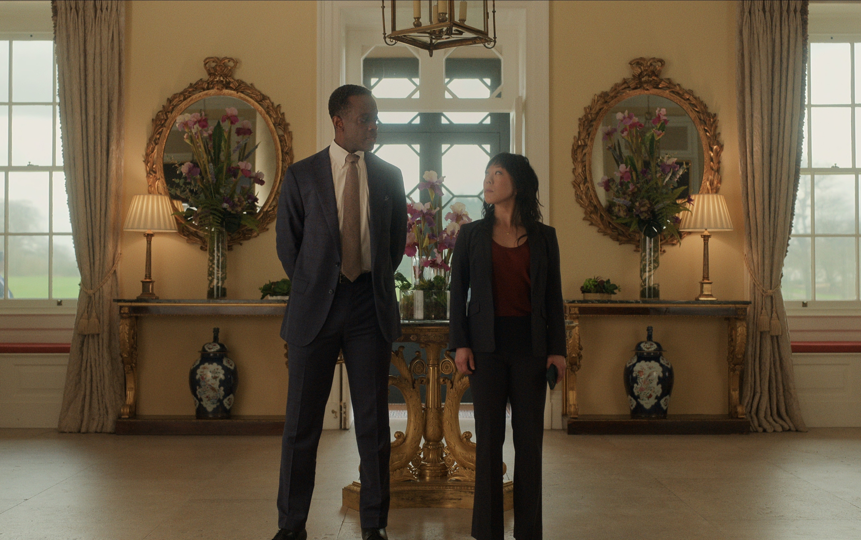 Ato Essandoh as Stuart Hayford, Ali Ahn as Eidra Park in The Diplomat