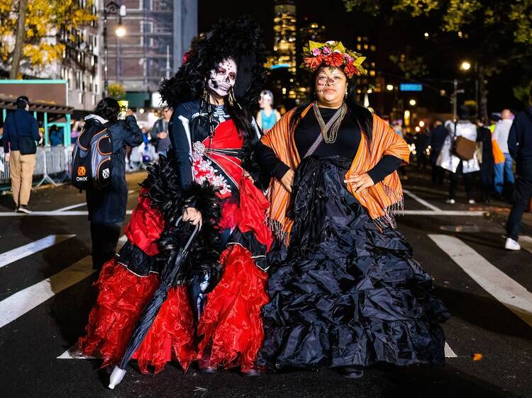 People wearing scary costumes at NYC Village Halloween parade