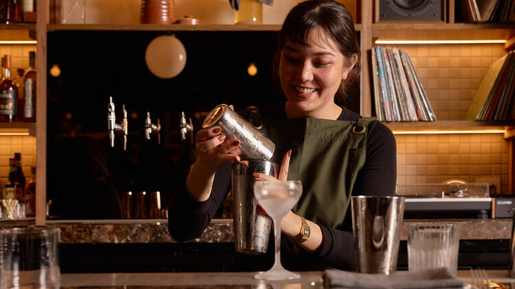 Kayla Saito at the bar.