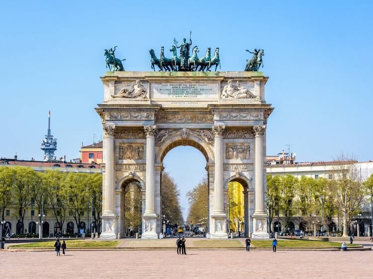 Milan, Italy - March 28, 2022: Front view of the Arco della Pace (Arch of Peace), a neoclassical triumphal arch located in Porta Sempione (Simplon Gate) completed in 1838.