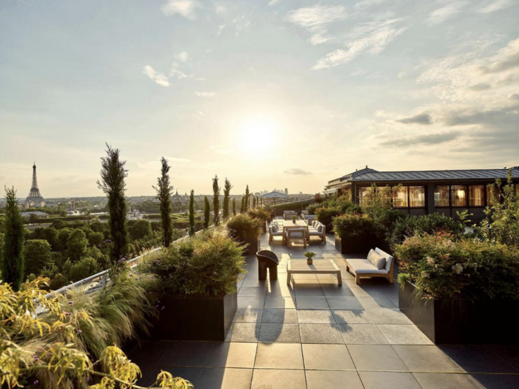 a hotel terrace overlooking Paris