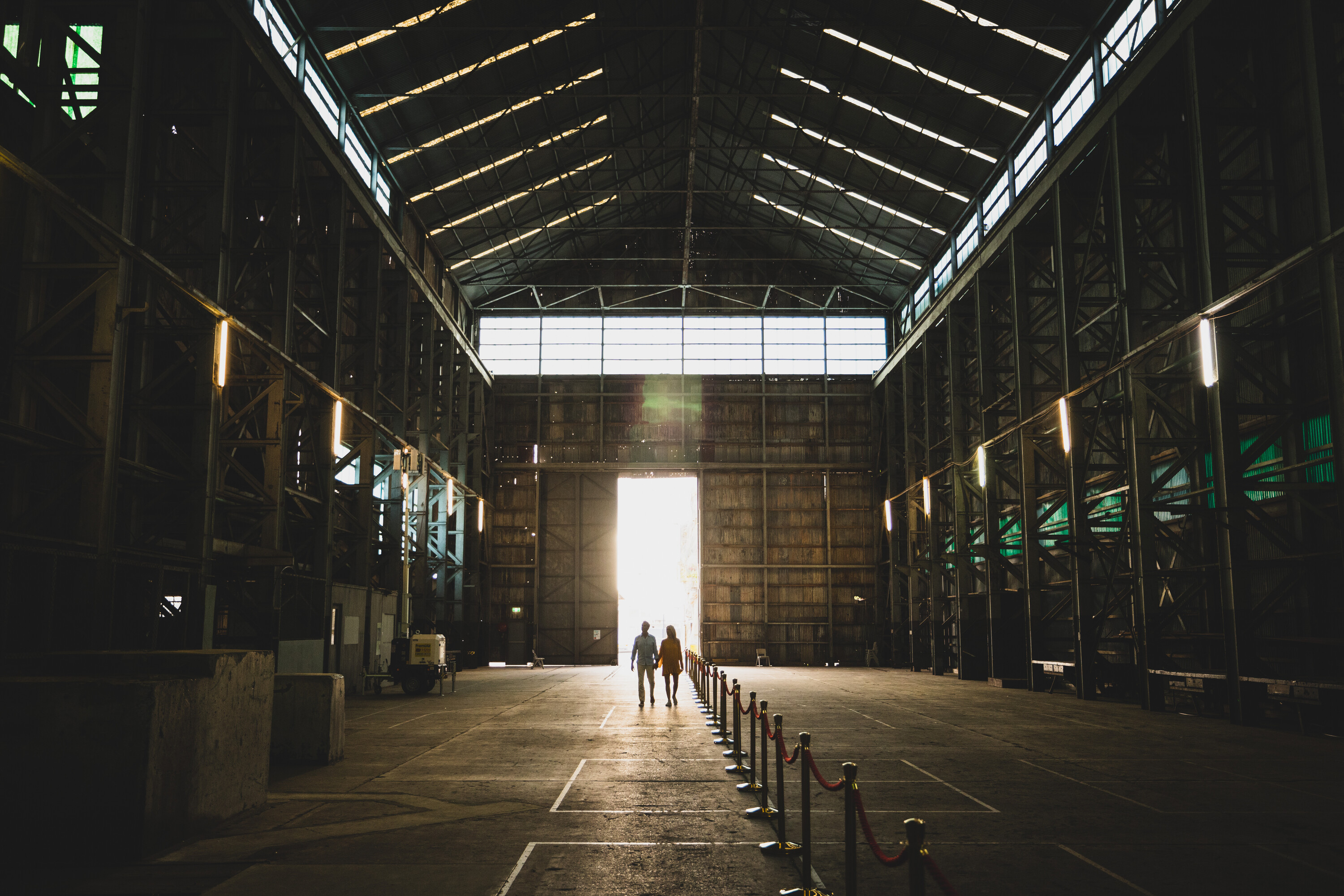 Couple walk to see Carmen opera on Sydney's Cockatoo Island