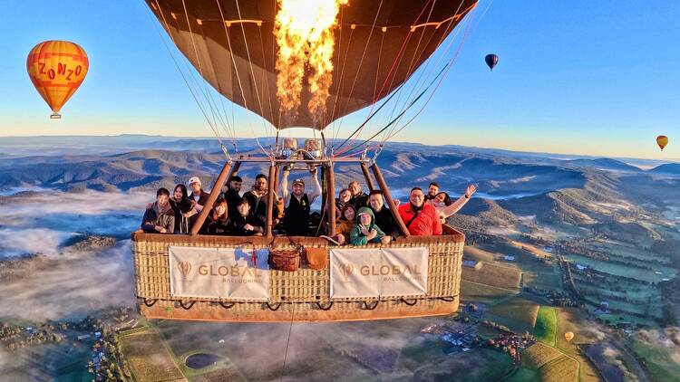 A group of people in a hot air balloon 