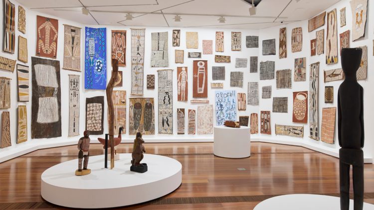 Expensive display of bark paintings on a curved wall