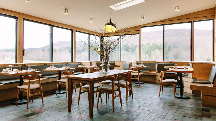 The glass-walled dining room at The DeBruce