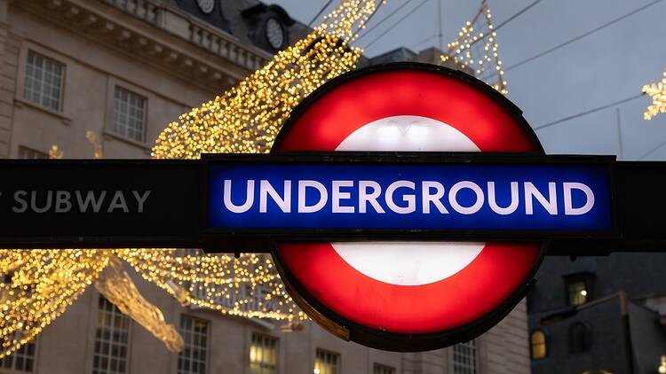 London Underground sign with Christmas decorations