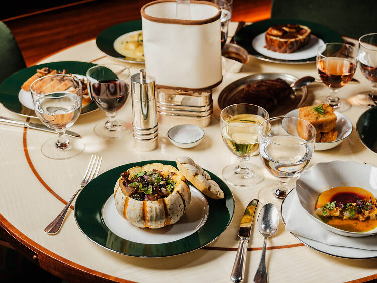 A white table filled with thanksgiving foods