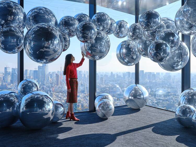 Shibuya Sky is celebrating Christmas with mirror balls and rooftop light shows