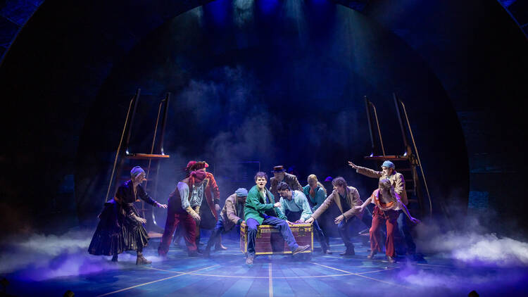 The cast of Peter and the Starcatcher on stage.