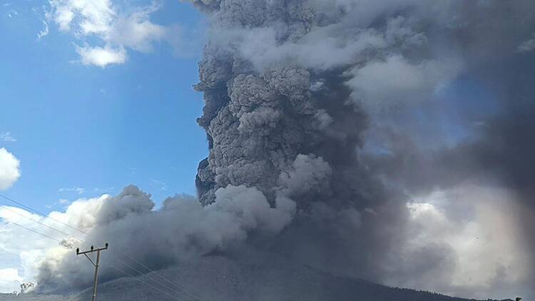 Mount Lewotobi Laki-Laki spews volcanic materials during an eruption, in East Flores, Indonesia, Thursday, Nov, 7, 2024.