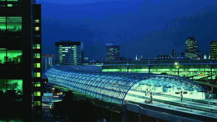 Photograph of the Waterloo International Terminal, showing a large curved glass structure.