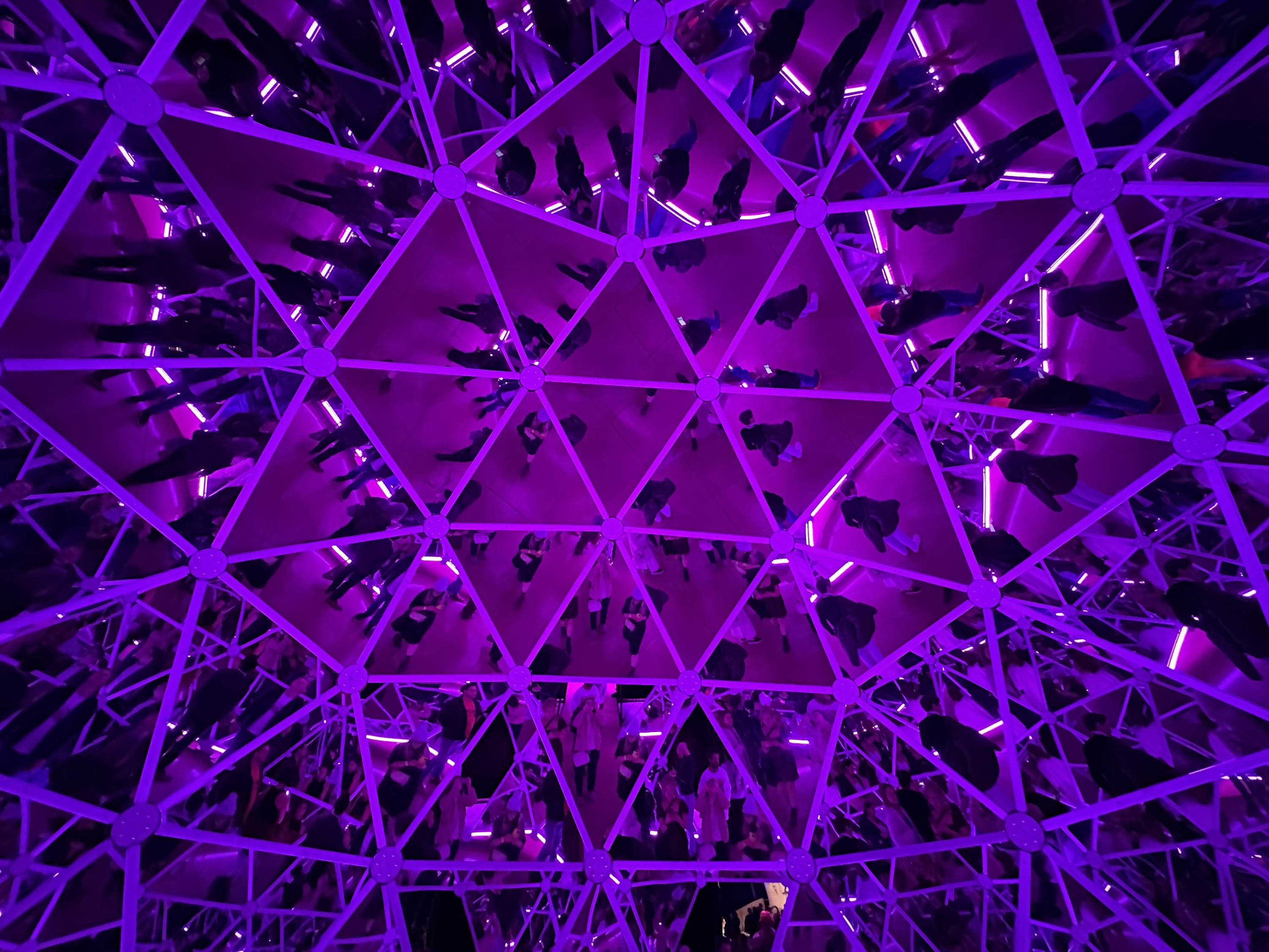 A purple-hued geodesic dome.