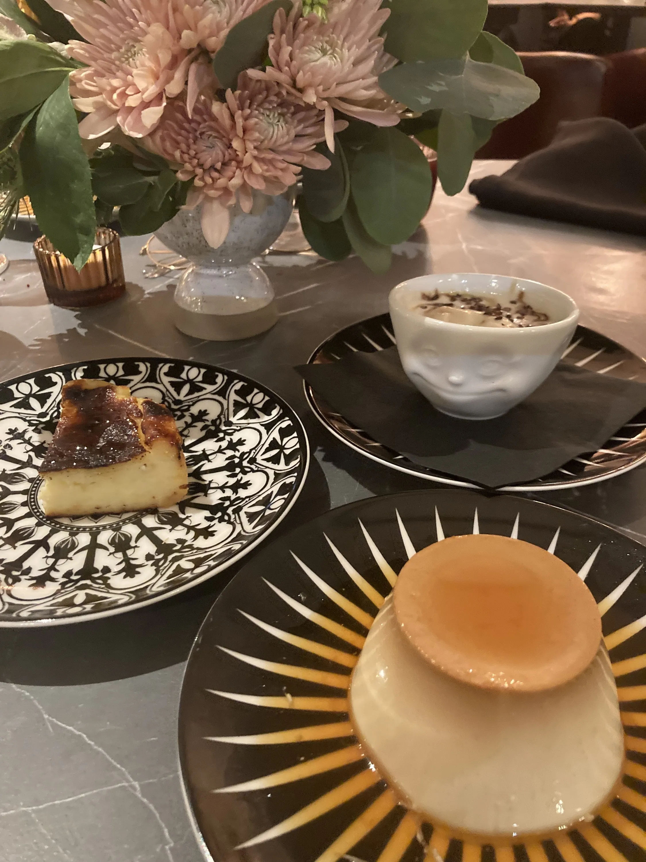 Desserts at Capital One Landing at DCA include burnt Basque cheesecake, oat milk soft serve, and flan.