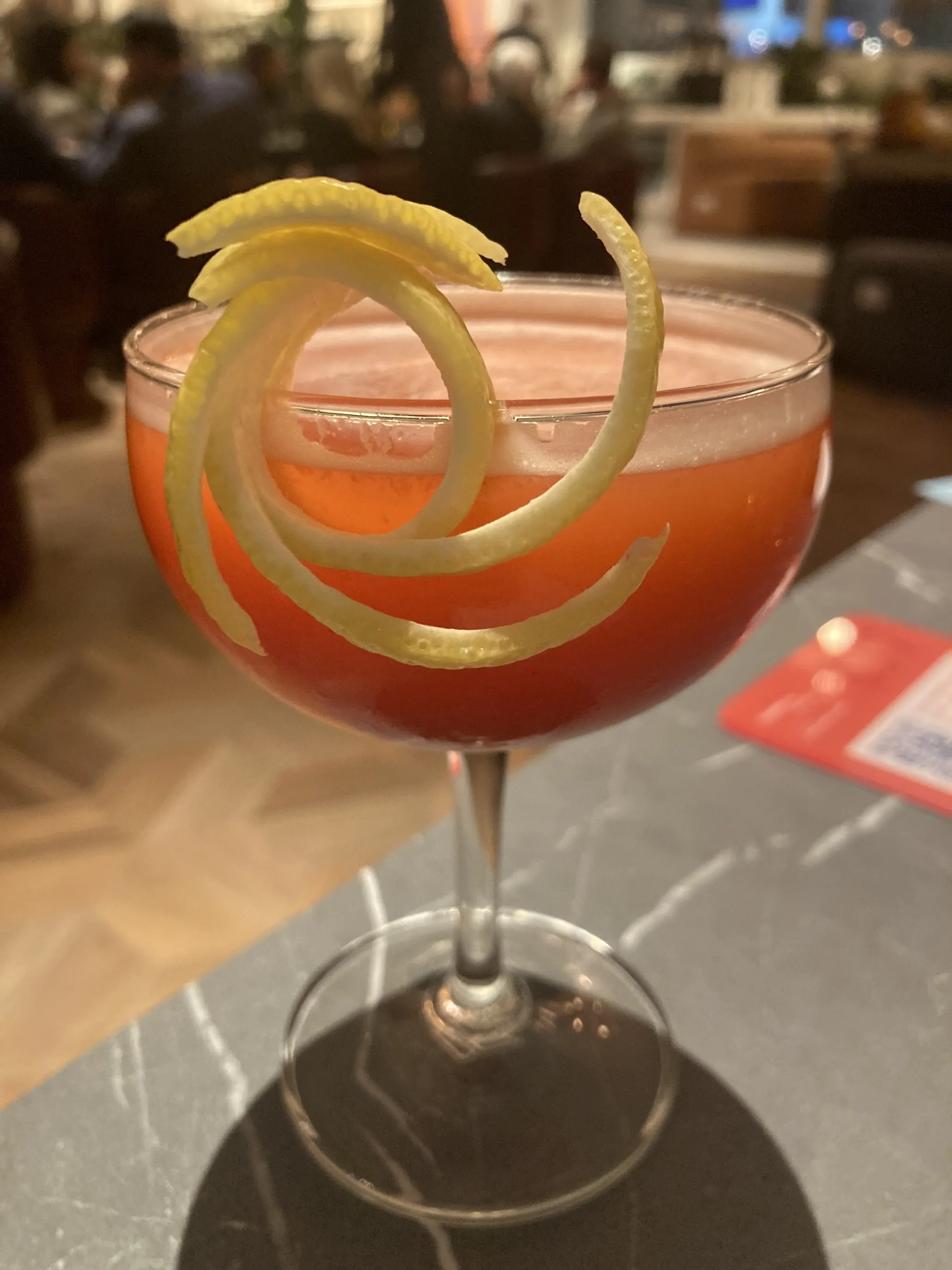 The Fresa y Piña, a non-alcoholic drink made with Lyre's apertif rosso, pineapple, demerara sugar, and strawberry.