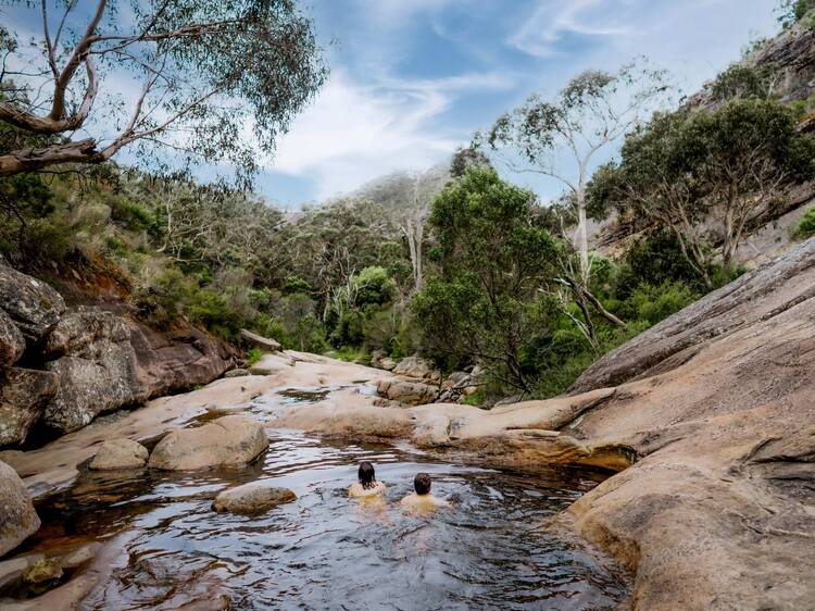 Couples swimming at Venus Baths