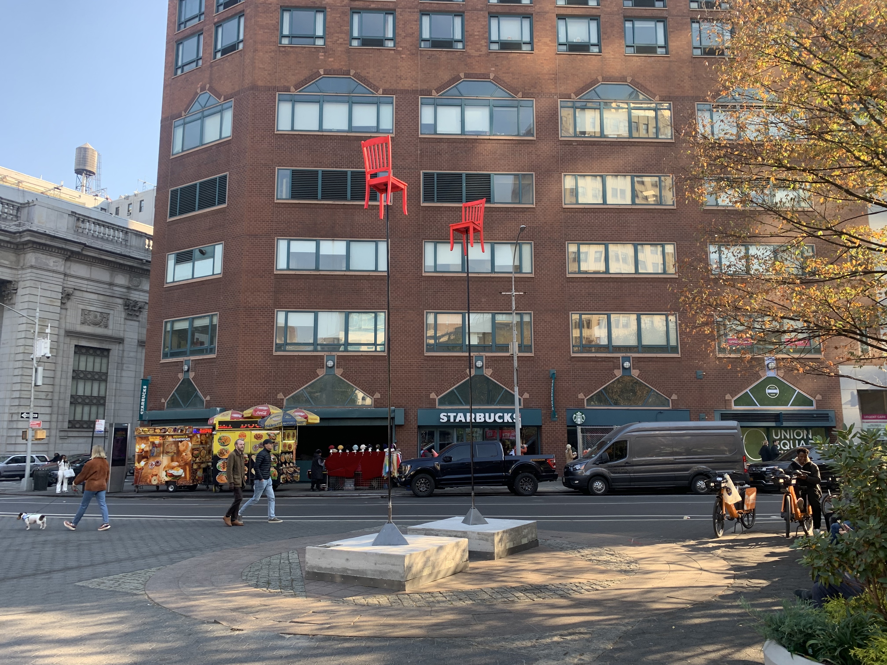 sculptures of two chairs floating above Union Square