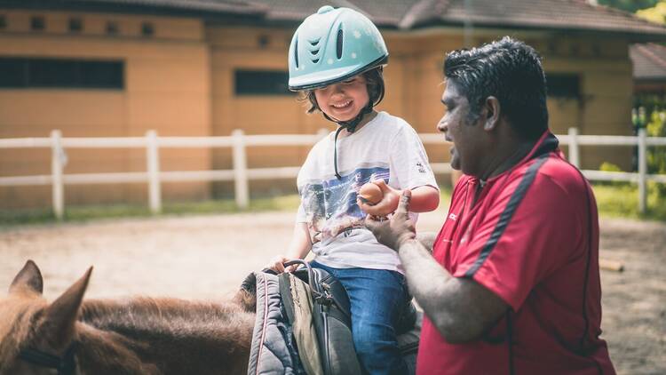 Ride a horse at Gallop Stable