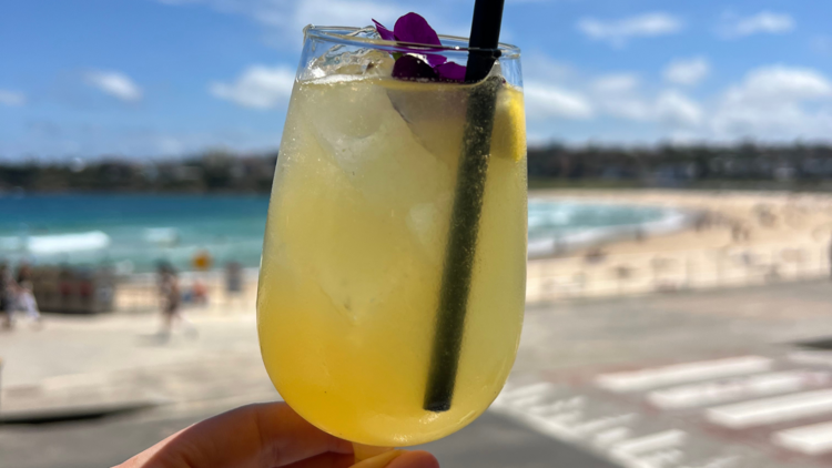 Avril holding a Spritz at North Bondi Fish