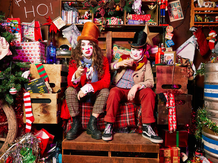 Sh!t Theatre’s Louise Mothersole and Rebecca Biscuit sit in Santa’s workshop