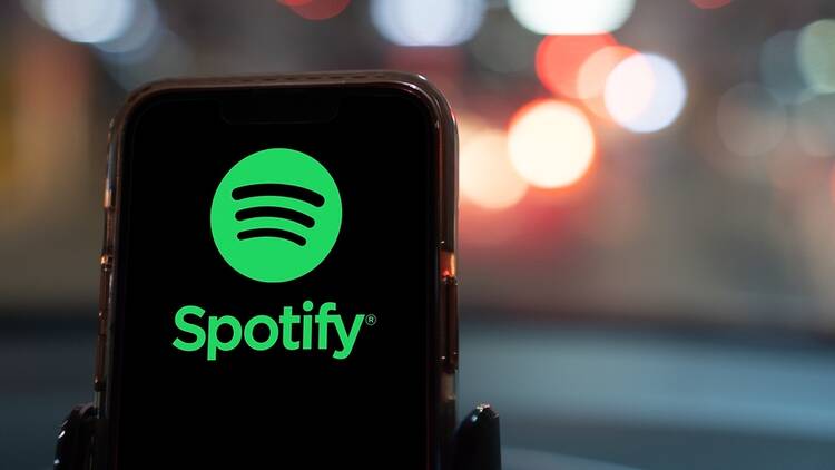 Phone with Spotify logo