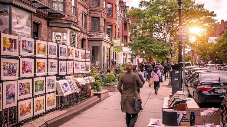 Boston, MA, USA - November 6, 2022 - The famous Newbury street in Boston downtown, MA, USA showcasing its expensive stores, locals and tourists shopping around, and its historic architecture.