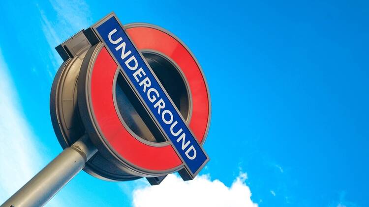 London Underground logo against a blue sky