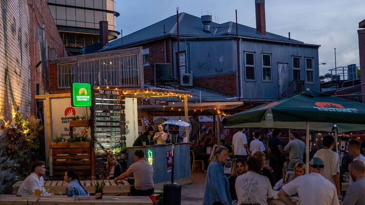 People gathered at an outdoor street party.