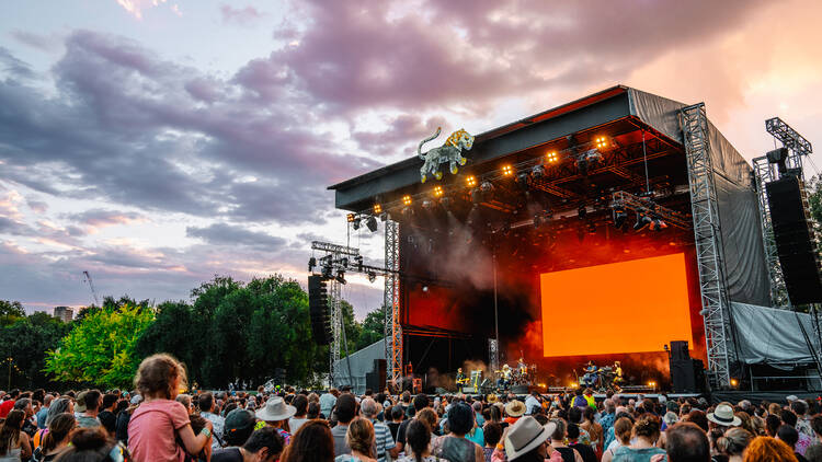 Outdoor festival stage with big crowd