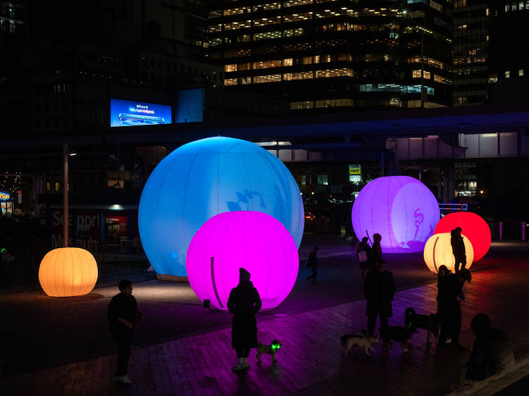 This new outdoor installation at Pier 17 lets you look inside giant snow globes