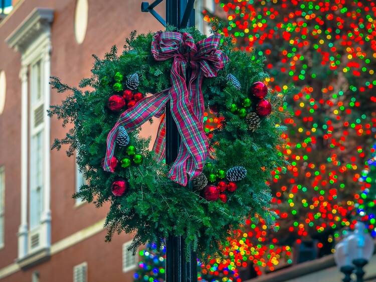 Christmas wreaths decorate the lamp posts in Boston's Downtown Crossing 