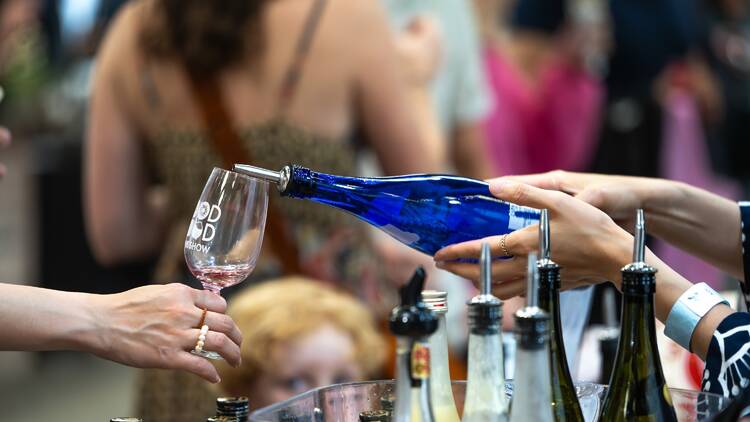 A person tasting a wine. 