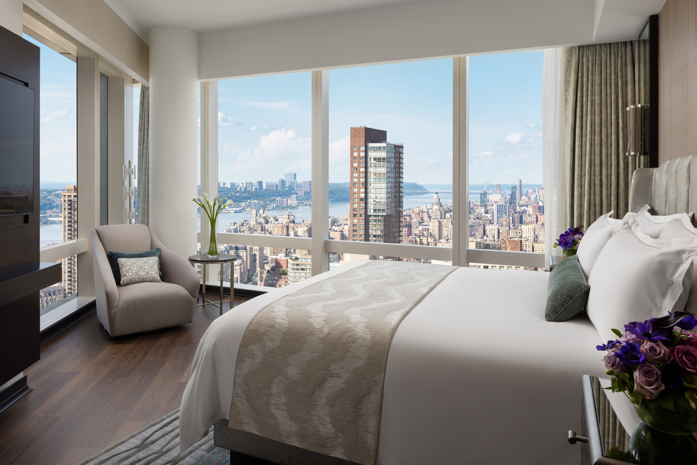 A hotel room with views of the Hudson River.