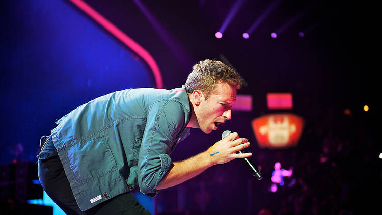 Chris Martin of Coldplay performing live