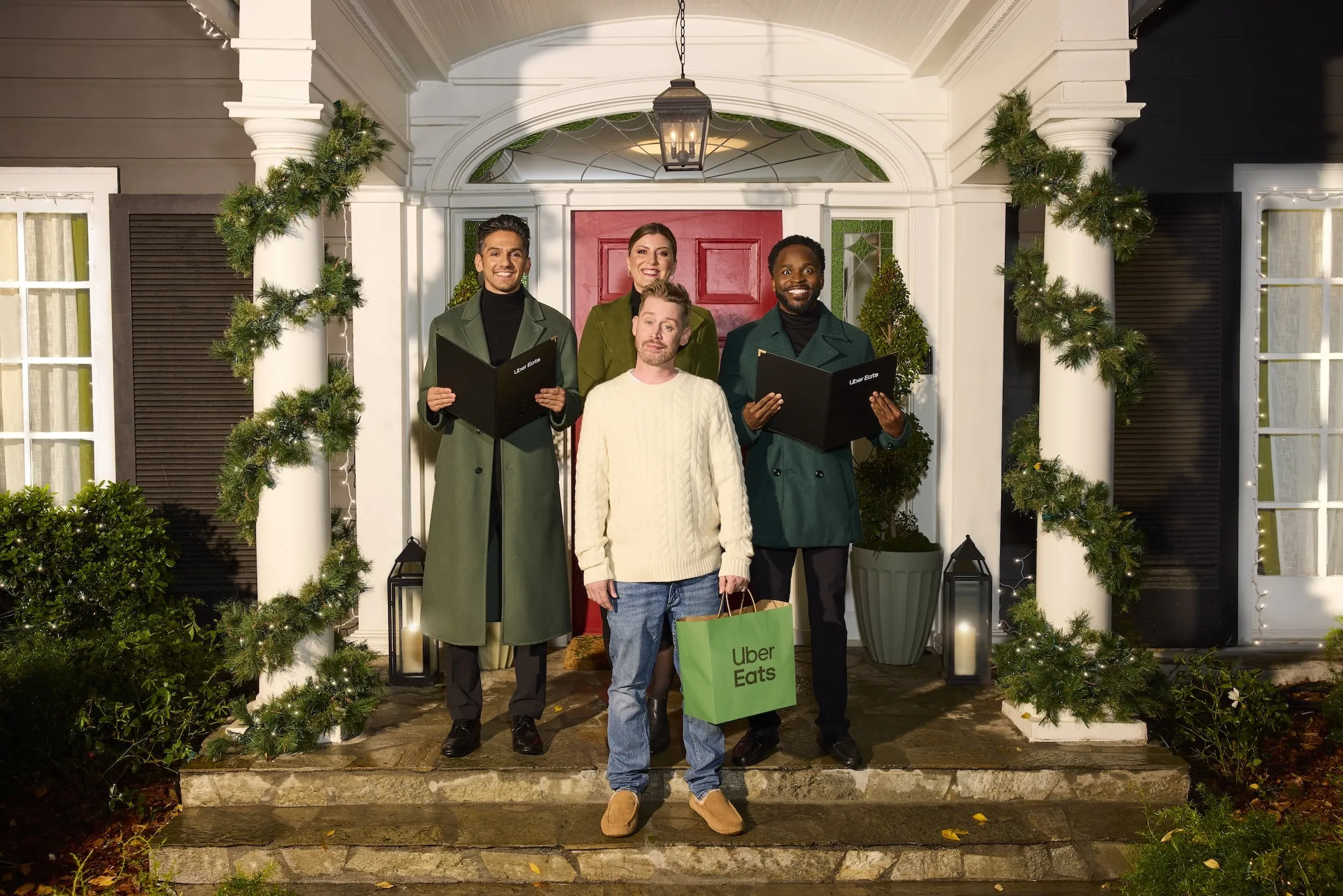 Carolers with Uber Eats spokesperson Macaulay Culkin.