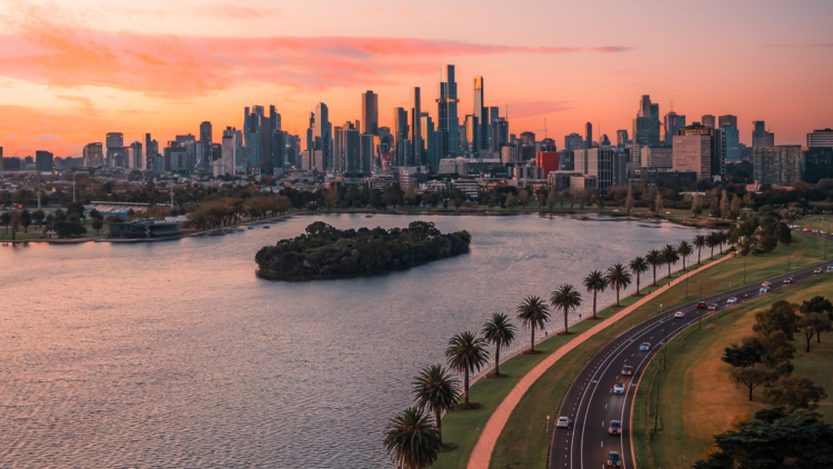 Aerial view of Melbourne city and river at sunset