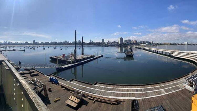 A  view overlooking Port Phillip Bay with St Kilda Pier in the foreground. 