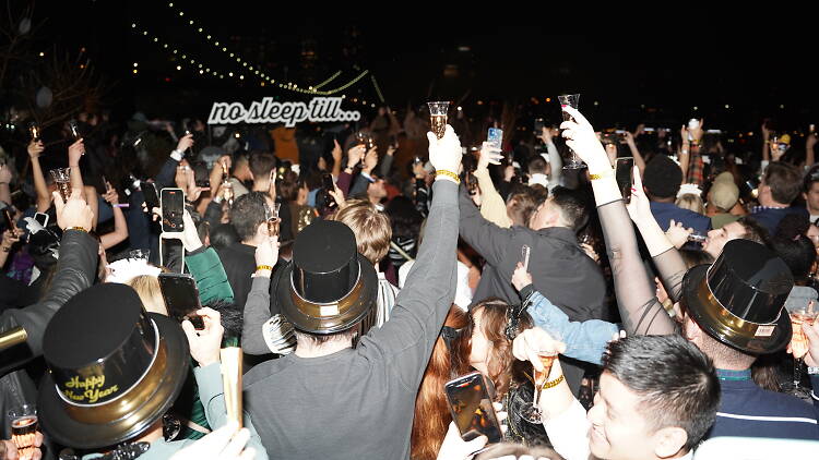Group of people dancing on Time Out Market's Rooftop